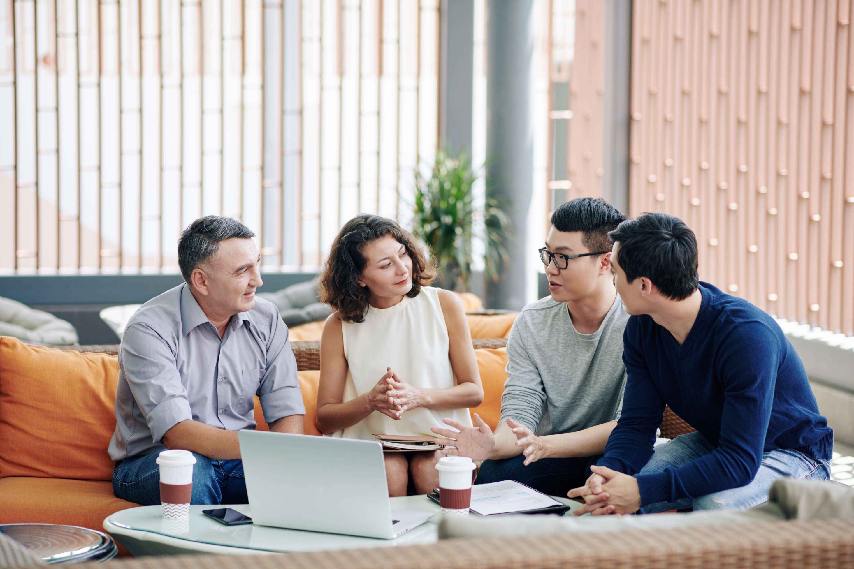 Business people listening to a colleague