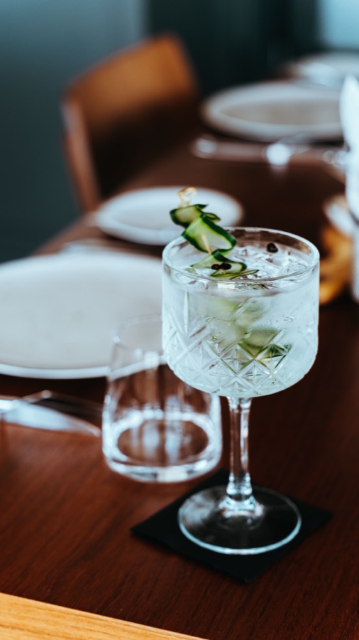 Craft tonic cocktail on a bar table